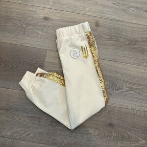 10/20$ WICKED Cream Gold Joggers/sweatpants size XS(4-5)